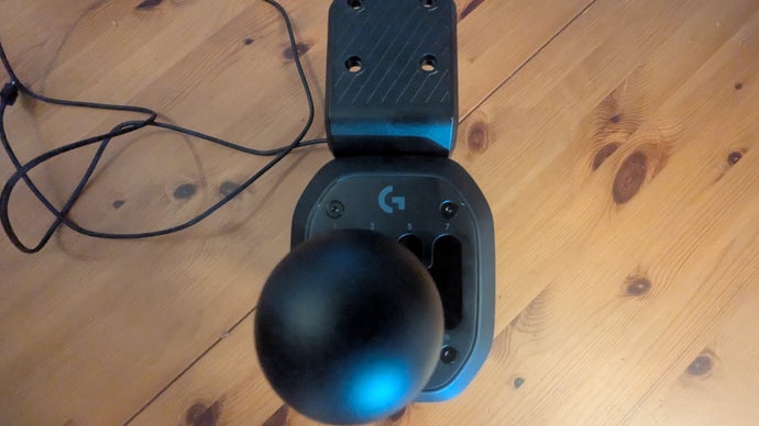 Accidental Hole in Desk from Logitech’s RS H-Shifter Leads to Increased Appreciation for Gear Shifting