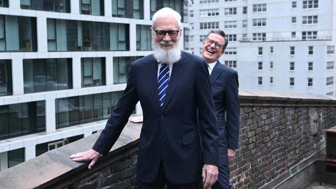 Stephen Colbert and David Letterman Engage in Rooftop Antics Featuring the Tossing of Items at a Giant CBS Bullseye